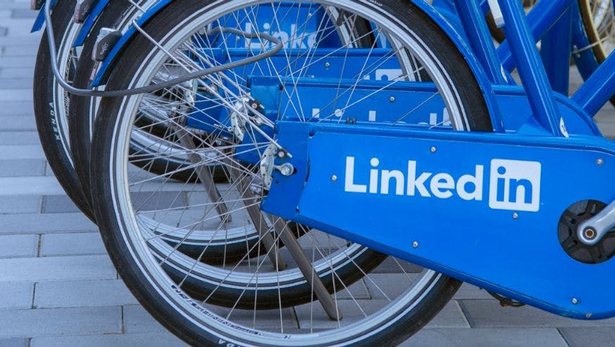 blue bicycle on gray concrete floor