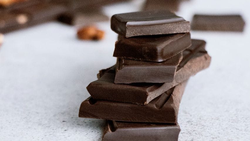 Brown Chocolate Bars On White Surface