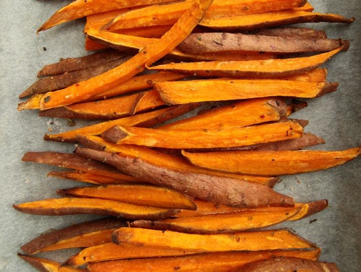 sliced carrots on gray surface