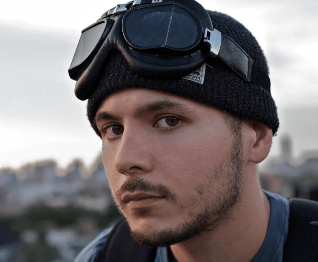 tim_pool_hat_glasses_on_head